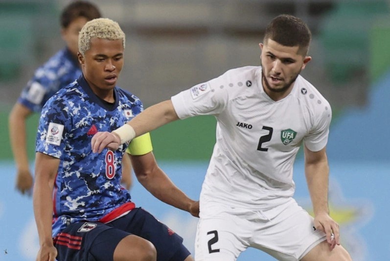 Doi truong U23 Nhat Ban: 'Toi nhu bi Uzbekistan nuot chung' hinh anh