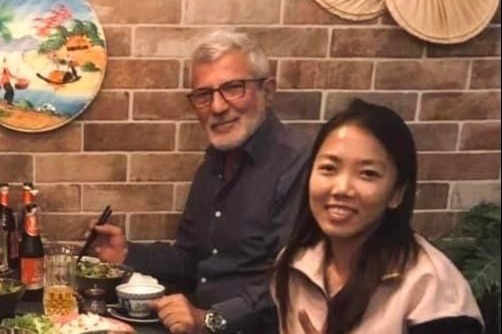 Huynh Nhu gap HLV Henrique Calisto hinh anh