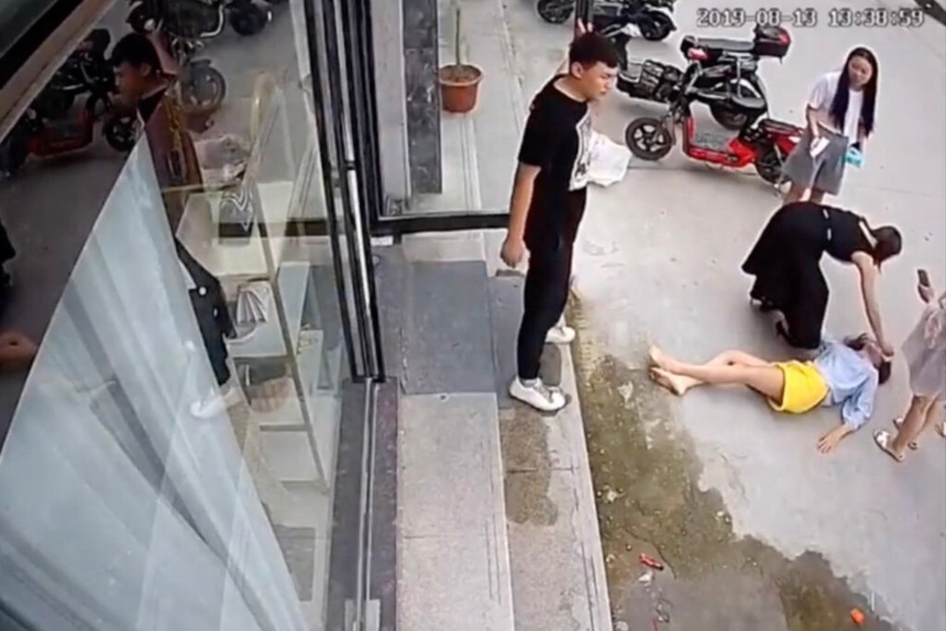 nữ nhà báo trung quốc bị chồng bạo hành đánh đập ảnh 2 nu nha bao trung quoc bi chong bao hanh danh dap anh 2