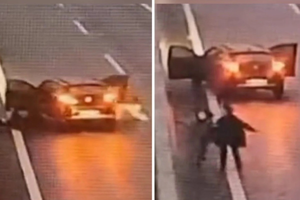 Hai nguoi phu nu Trung Quoc ra khoi xe khi oto chua dung han hinh anh