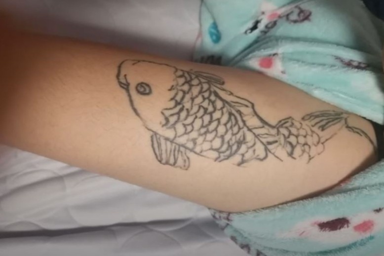 Ke bat nat Han Quoc ep ban hoc xam hinh ca chep, dau quy hinh anh