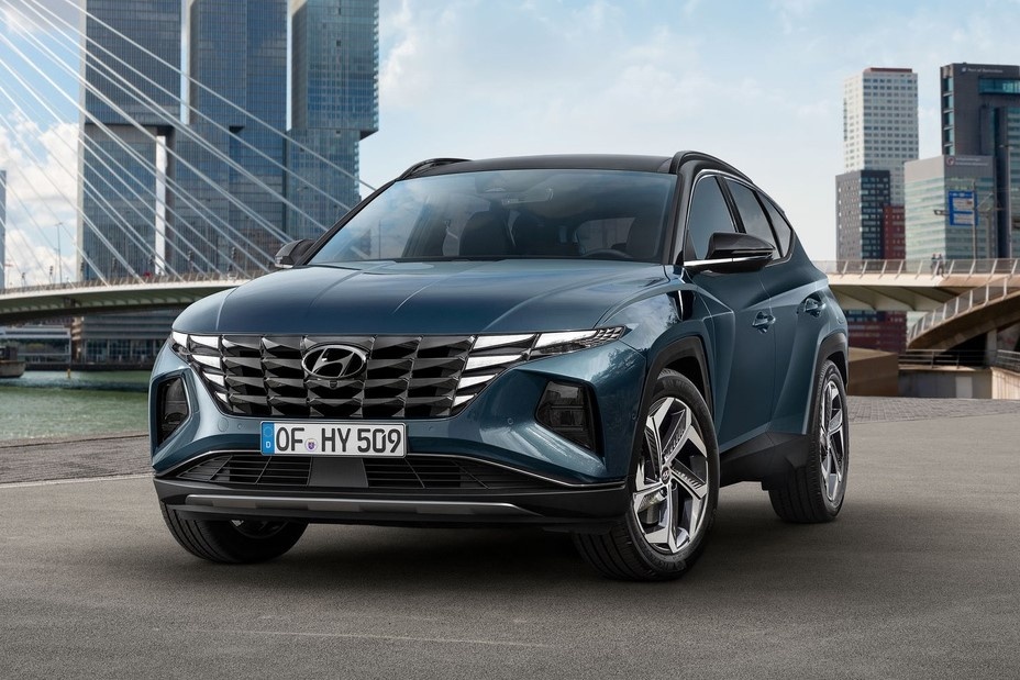 Hyundai Tucson 2021 và Kia Sportage 2022 ảnh 1 Hyundai Tucson 2021 va Kia Sportage 2022 anh 1