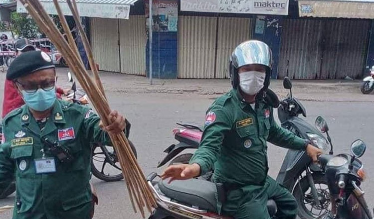 Canh sat Phnom Penh se quat roi nguoi vi pham lenh phong toa hinh anh