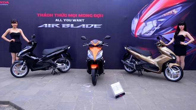 Không có nhiều thay đổi trên Air Blade mới ngoại trừ tem xe và màu mới. Ảnh: Huy Thắng.
