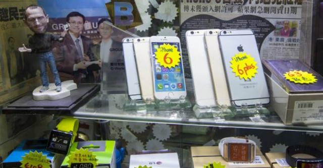 Nguy co buon lau tang khi iPhone cham ra mat tai Trung Quoc hinh anh