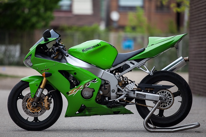 It might raise an eyebrow or two to place the 2003 ZX-6R above the two previous machines in the pantheon of 600s, but we’re talking about ‘legend’ status here rather than more easily defined attributes. For us the green machine – and particularly the short-lived version with the reverse-angled headlights from 2003-2004 – has a certain something that the R6 and the CBR600RR miss out on. It was really down to the sheer level of kit this bike had. When most 600s had right-way-up forks and ‘budget’ brakes, it got radial calipers and beefy upside-downers. There was a lap timer on the dash, back when such a thing was unusual enough to be worth mentioning. And it just felt so small and focussed compared to its predecessors.    Read more: http://www.visordown.com/motorcycle-top-10s/top-10-legendary-600s/25918.html#ixzz3KzVHagLW
