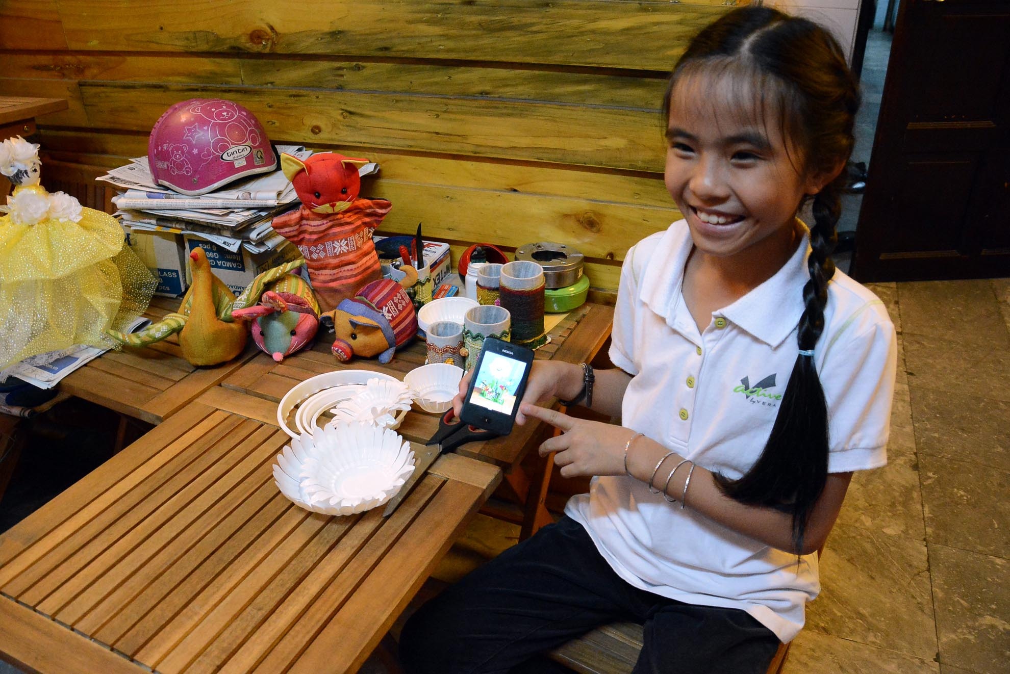 Co be 9 tuoi mo quan ca phe doc dao tai Sai Gon hinh anh