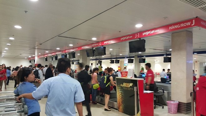 Tan Son Nhat lai gap su co check in anh 2