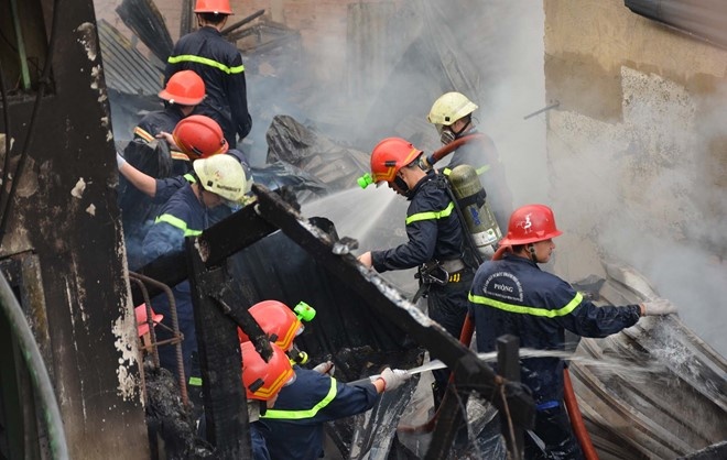 Dan Sai Gon lo tiep khach Tet, 24 can nha bi chay hinh anh