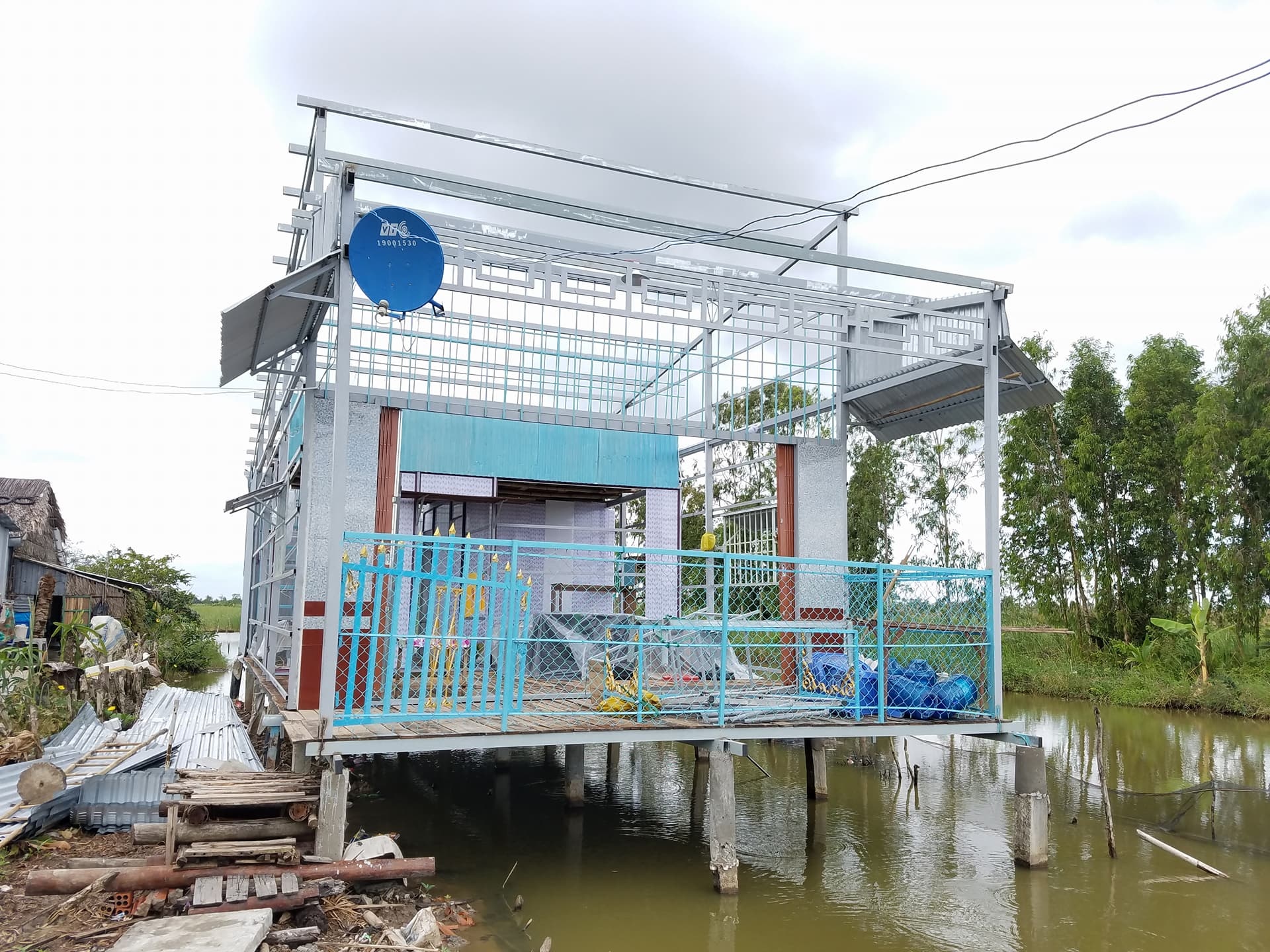 Tháo dỡ nhà chống bão ảnh 2 Thao do nha chong bao anh 2