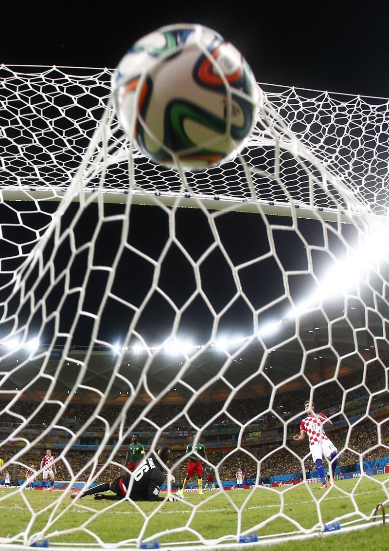cameroons-goalkeeper-charles-itandje-lets-a-croatia-goal-fly-by-him-in-the-net