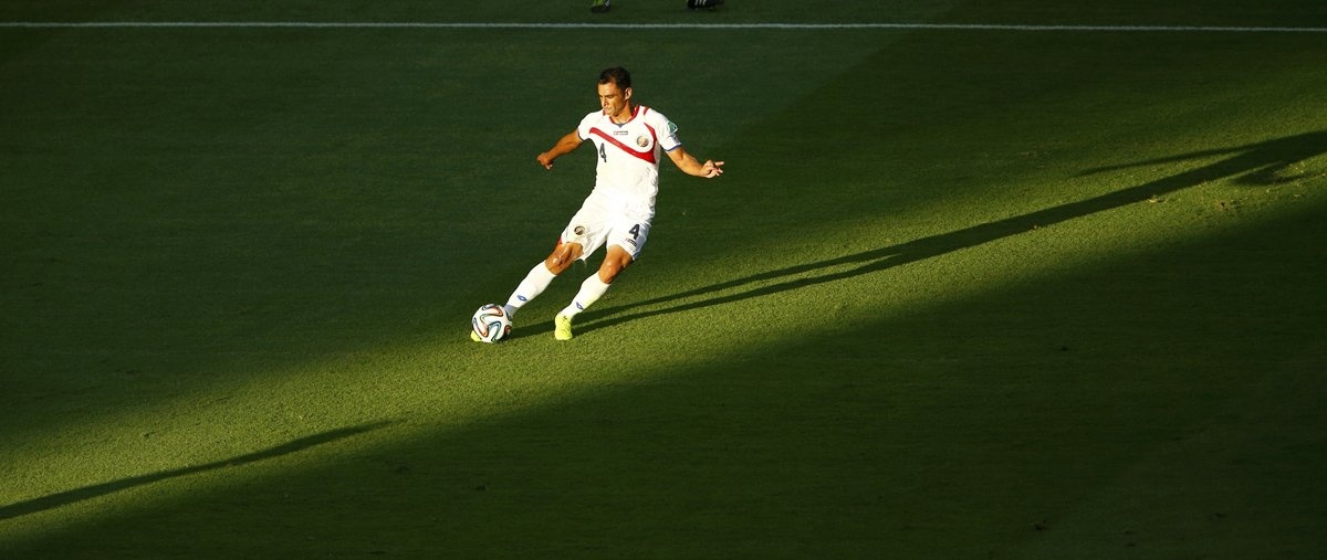 costa-ricas-michael-umana-dribbles-the-ball-in-a-game-against-uruguay