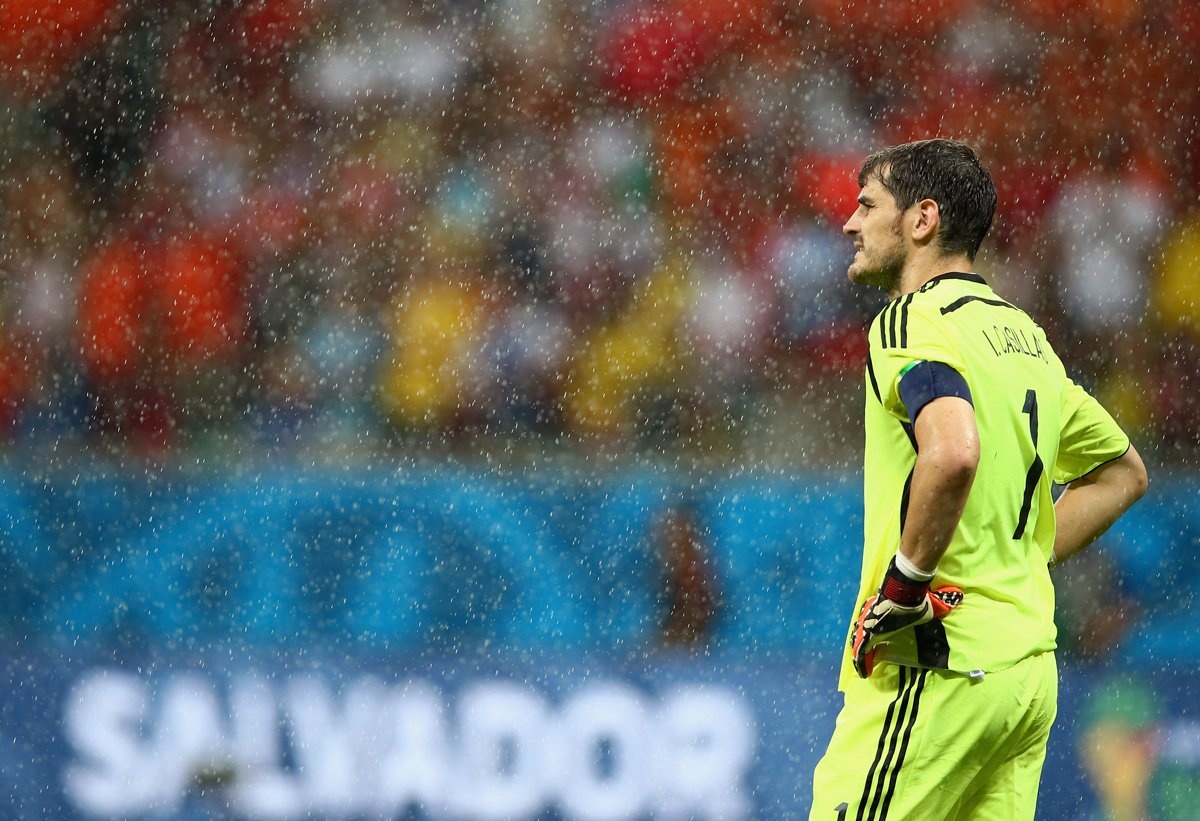 spains-goalie-iker-casillas-looks-on-as-the-rain-pours