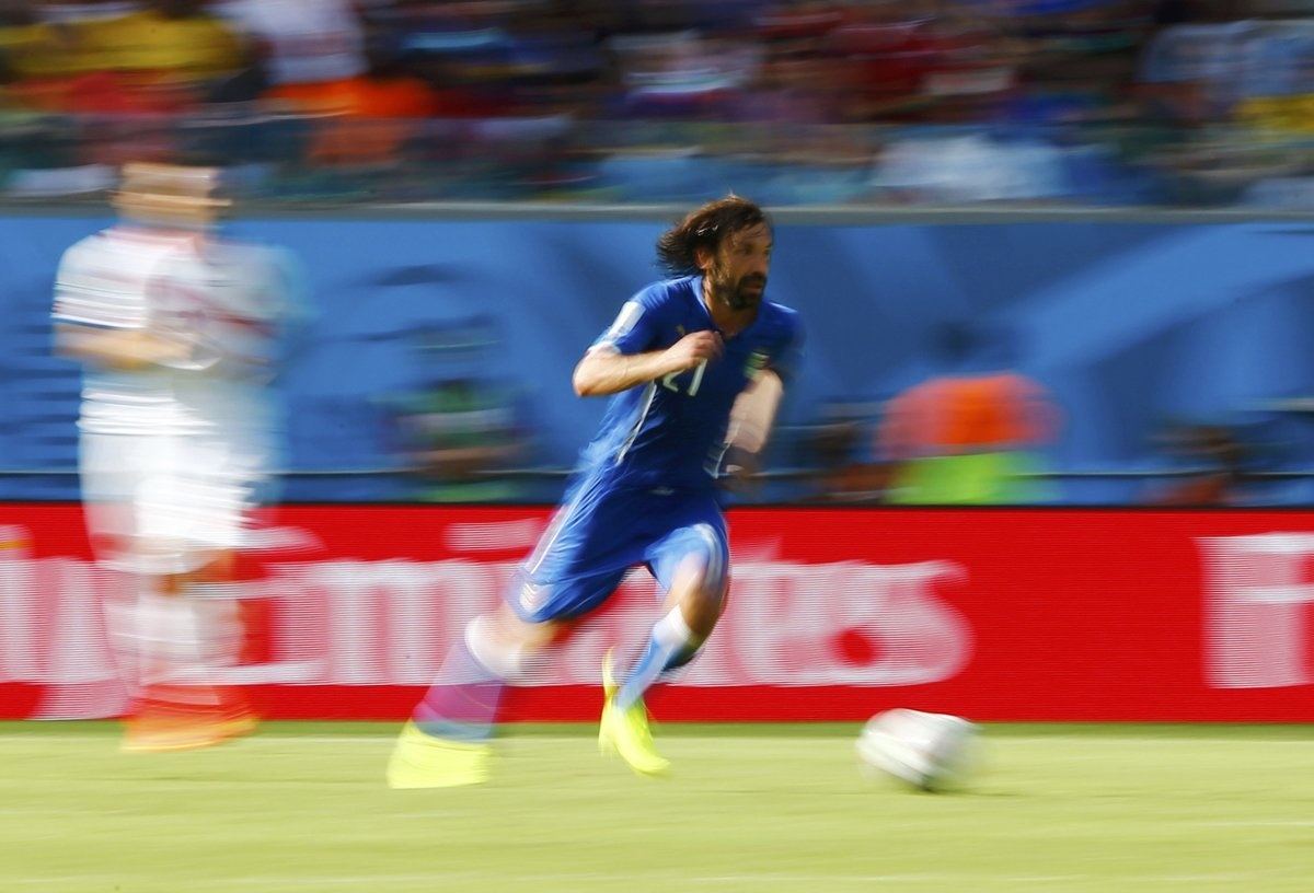 italys-andrea-pirlo-speeds-down-the-field.j