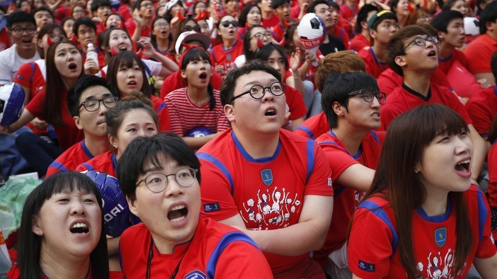 Star-gazing. Supporters, including these in Seoul, pack out fan-zones all over the world and Facebook announce there were more than one billion World Cup-related interactions during the first half of the tournament