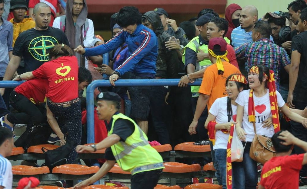 'Nhieu phu nu Viet bi nguoi Malaysia dap len lung, suon' hinh anh