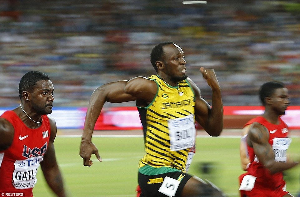 Usain Bolt vao chung ket noi dung 200 m hinh anh
