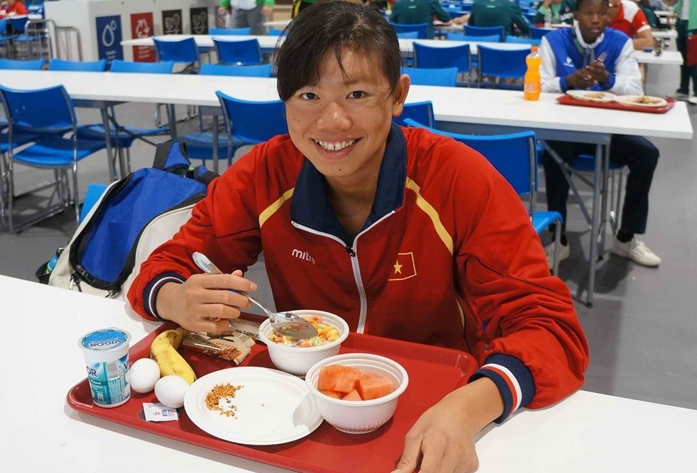 Van dong vien Olympic xin Bo truong tang che do dinh duong hinh anh