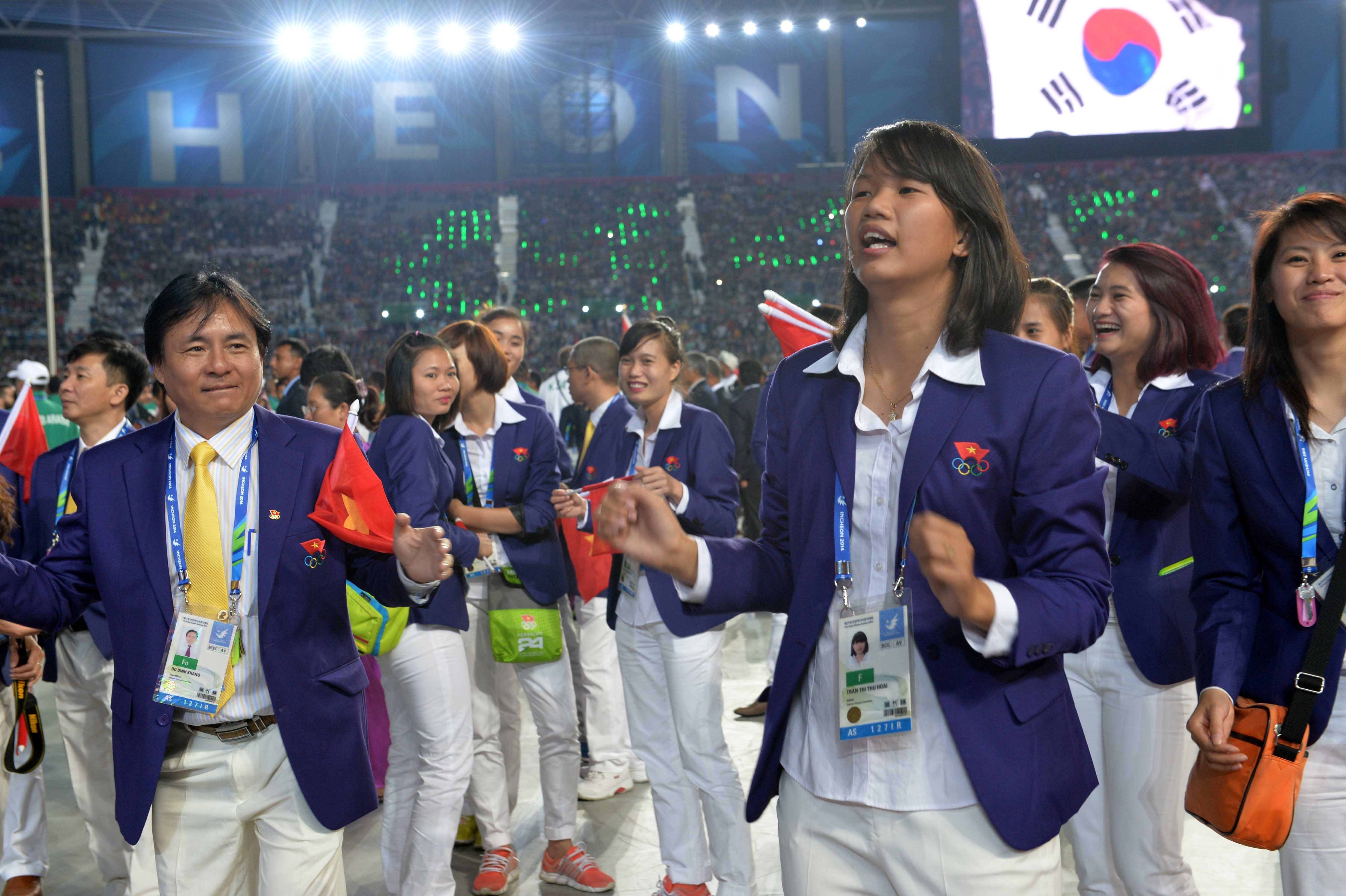 Các VĐV cùng hòa theo những điệu nhạc sôi động do các ban nhạc nổi tiếng của Hàn Quốc trình diễn.