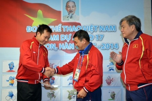 Xuan Vinh duoc trao quyet dinh thang ham dai ta tai ASIAD hinh anh