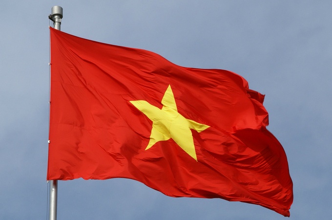 Quoc ky Viet Nam tung bay o Lang Olympic hinh anh
