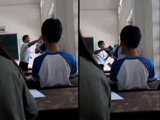 Thay giao danh tay doi voi hoc sinh trong lop hinh anh