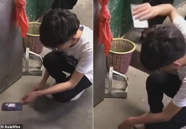 hoc sinh dap dien thoai anh 1