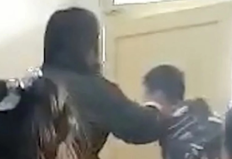 Lo clip tat hoc sinh, giao vien tieu hoc bi dinh chi cong tac hinh anh