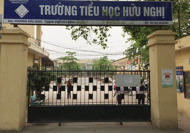 Phong GD&DT Hoa Binh noi ve viec phu huynh hanh hung be lop 1 hinh anh