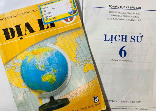 Nhieu noi lo ve sach giao khoa tich hop hinh anh