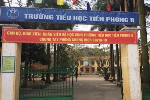 Xet nghiem SARS-CoV-2 cho mot lop o Ha Noi hinh anh