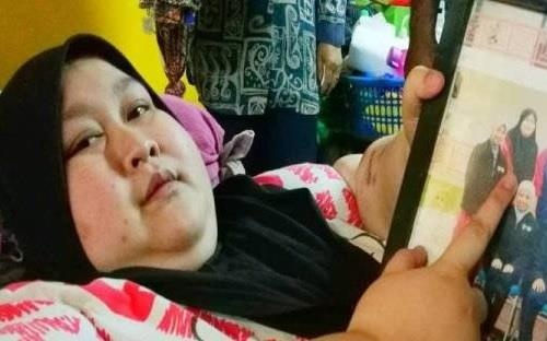Co gai tang 100 kg trong 3 thang vi mac benh la hinh anh