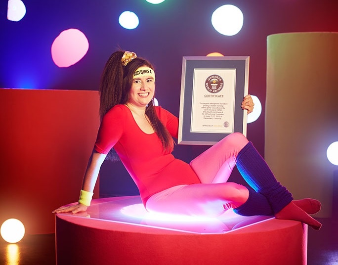 Nu giao vien lap 13 ky luc Guinness, giam 34 kg nho game hinh anh