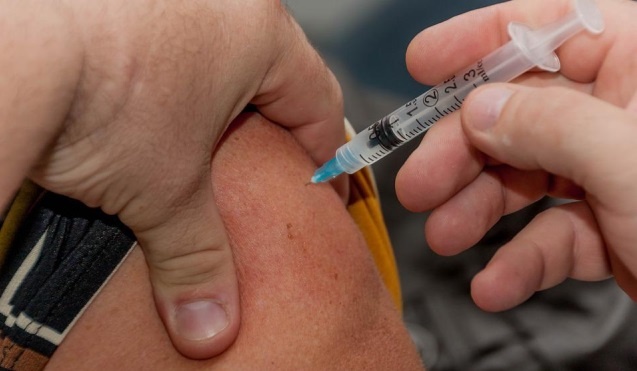 tieu diet HIV/AIDS chi bang mot mui tiem anh 1