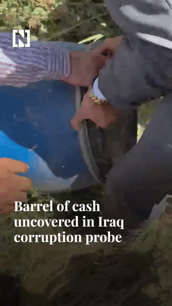 Thùng tiền triệu USD giấu trong bụi cây ở Iraq