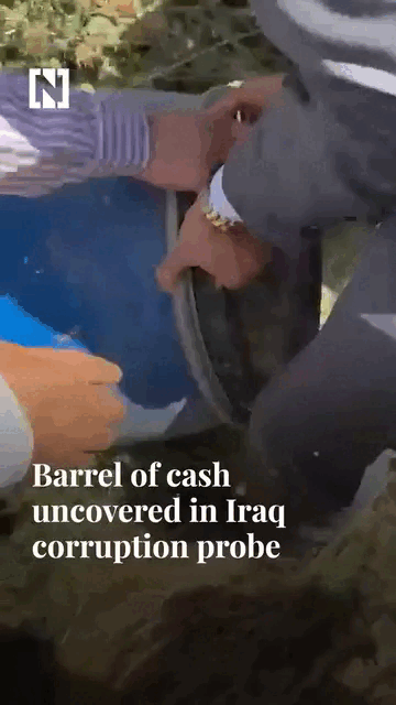 Thùng tiền triệu USD giấu trong bụi cây ở Iraq