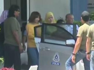 Hinh anh dau tien nghi pham vu Kim Jong Nam tai don canh sat hinh anh