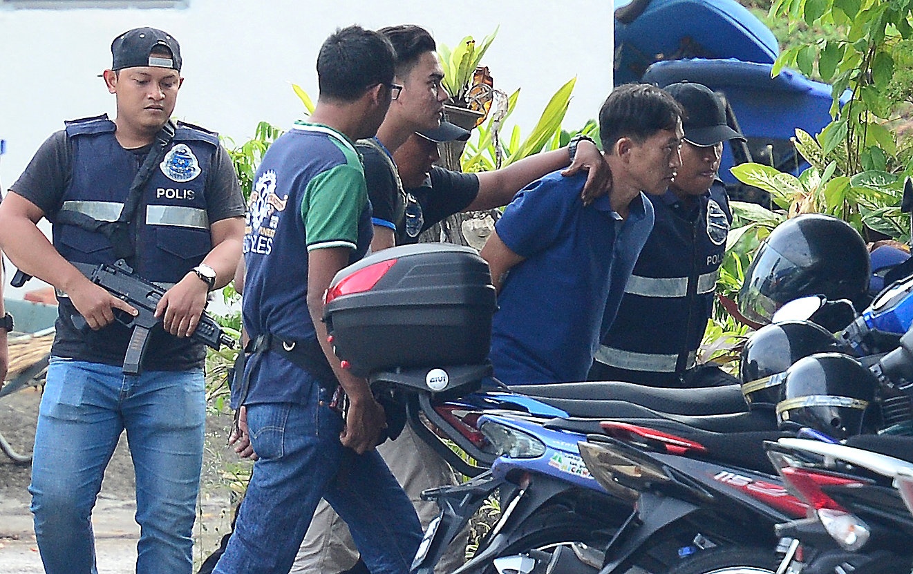 Nghi an Kim Jong Nam: Nguoi duoc tha phai mac ao chong dan hinh anh