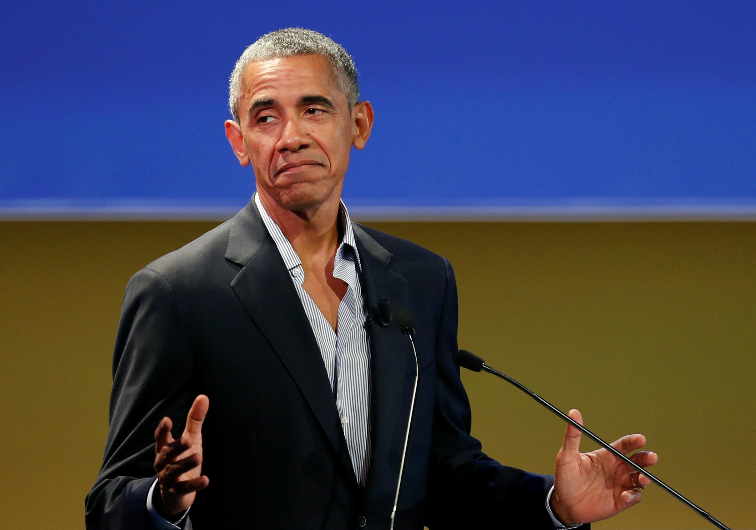 Obama xuat hien day phong cach o kinh do thoi trang Milan hinh anh