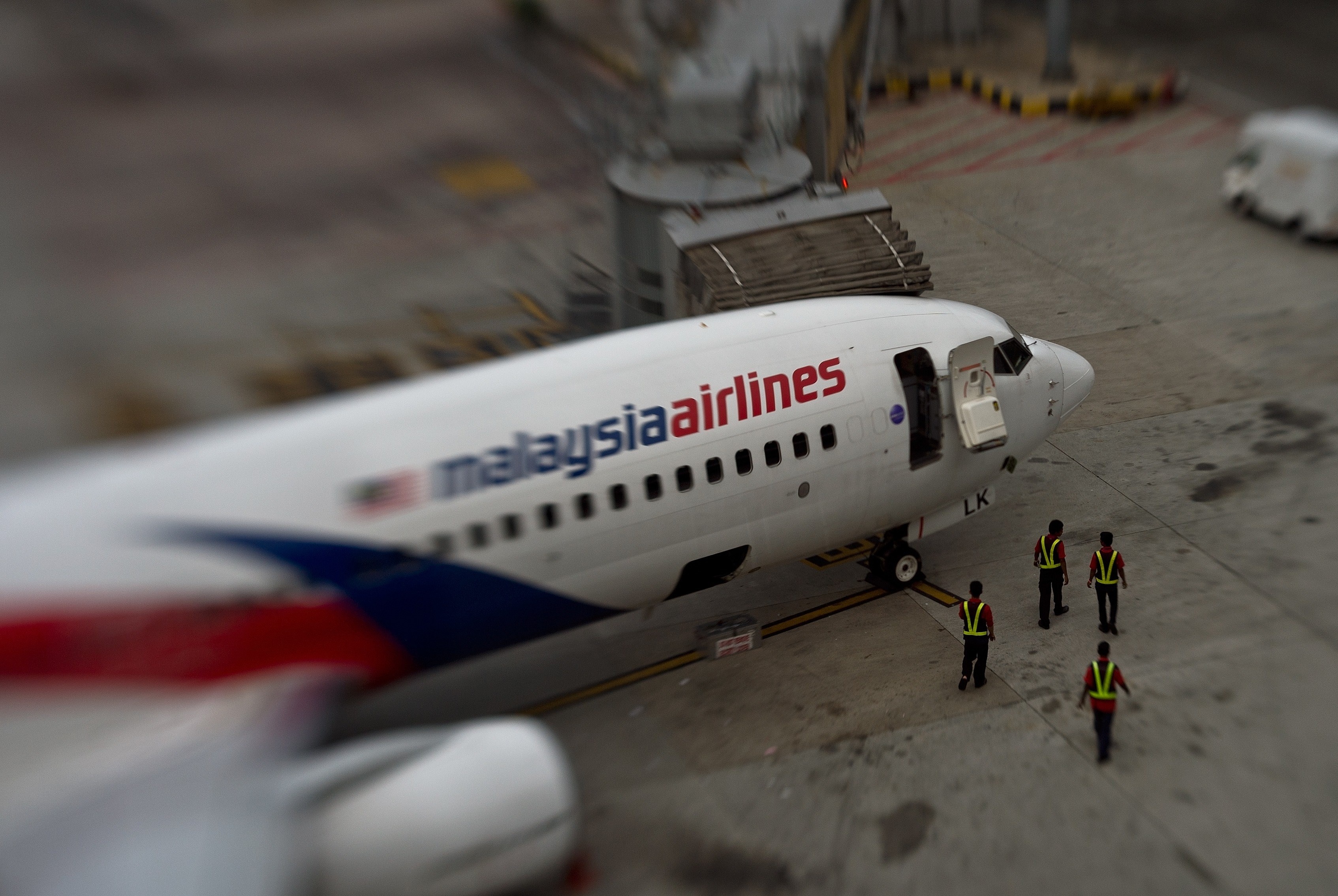 May bay Malaysia Airlines vua cat canh da phai quay dau hinh anh