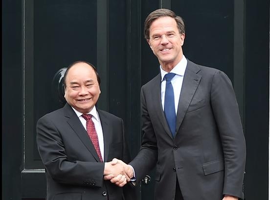 Thu tuong Nguyen Xuan Phuc hoi dam voi Thu tuong Ha Lan Mark Rutte hinh anh