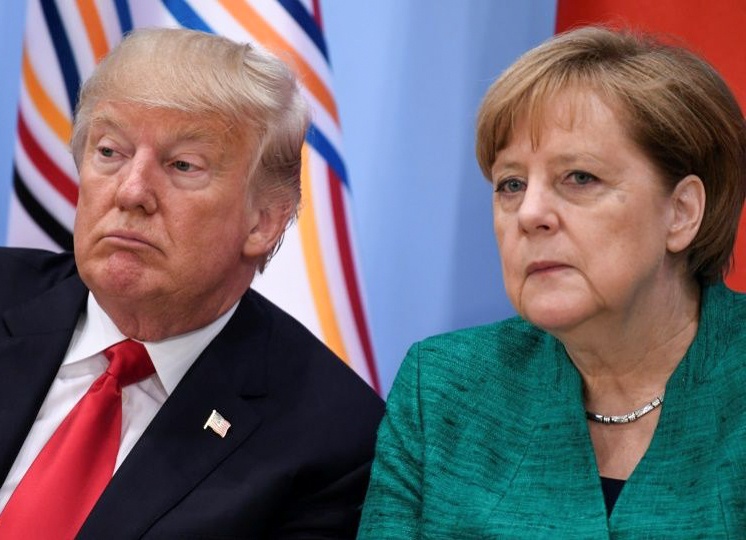 Trump va Merkel: Doi tac toan cau, nghin trung xa cach hinh anh