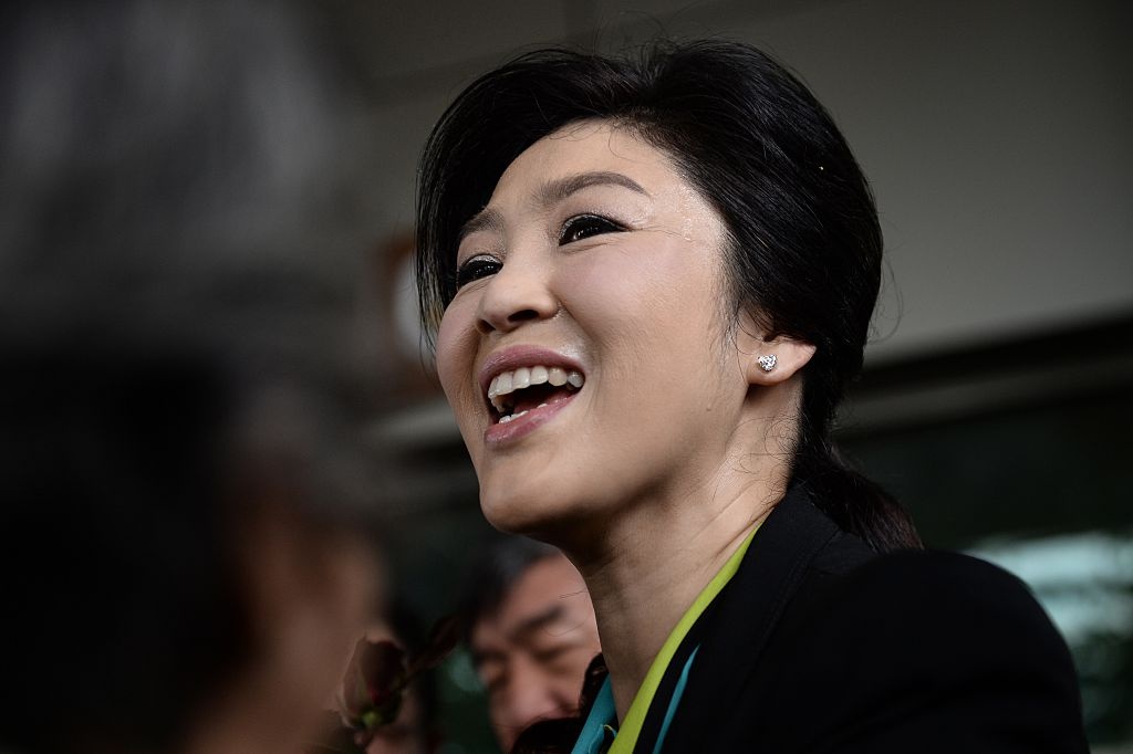 Anh em cuu thu tuong Yingluck xuat hien tai Singapore hinh anh