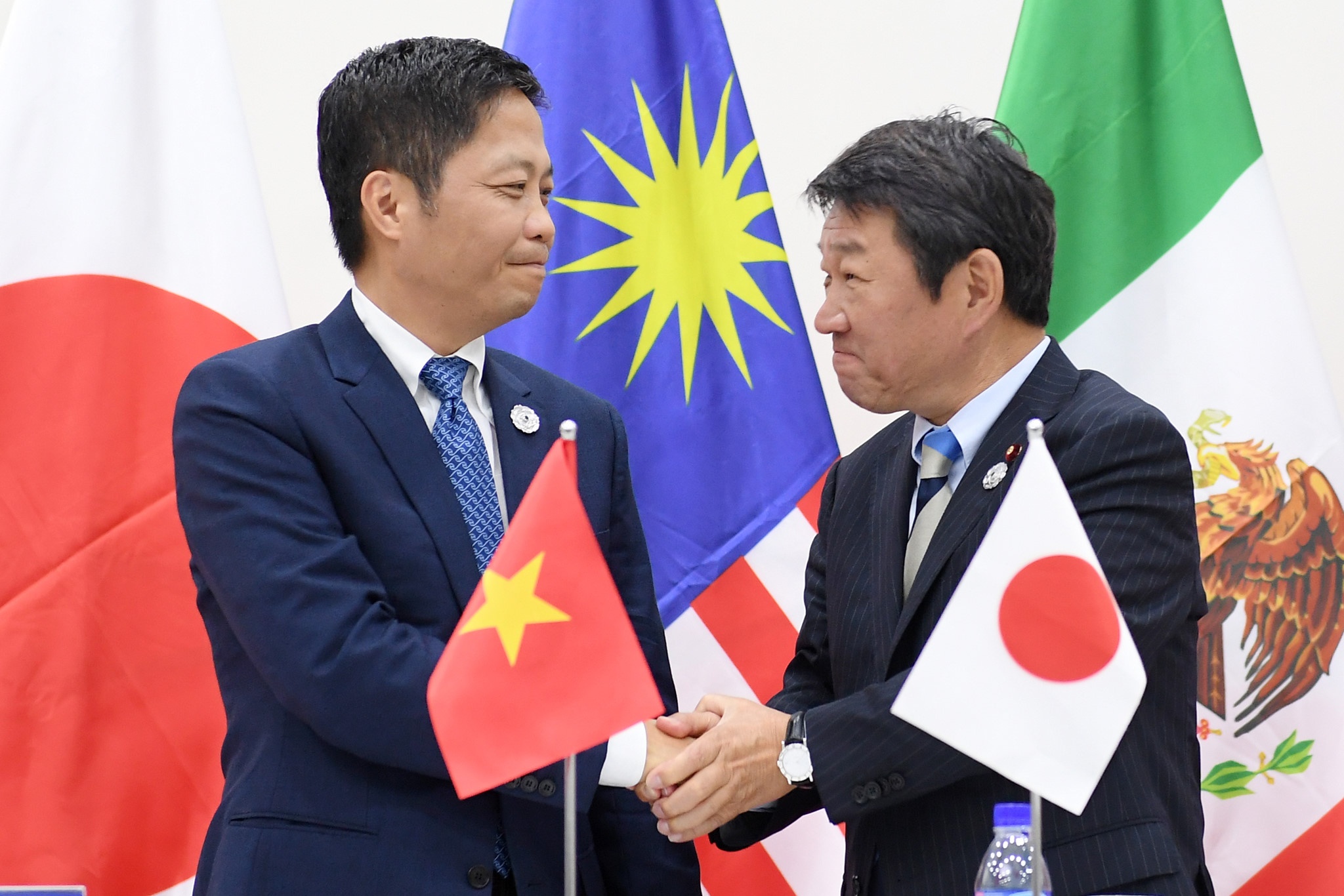 TPP-11: Tu hiep dinh suyt do be den nguoi bao ve toan cau hoa hinh anh