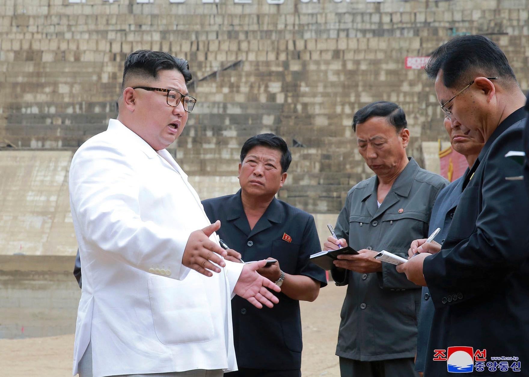 Kim Jong Un tap trung vao kinh te giua luc dam phan hat nhan be tac hinh anh