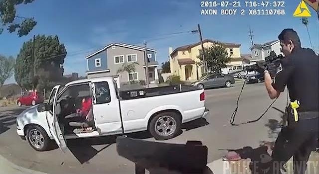 Hai canh sat ban 76 phat vao nghi pham o My khong bi truy to hinh anh