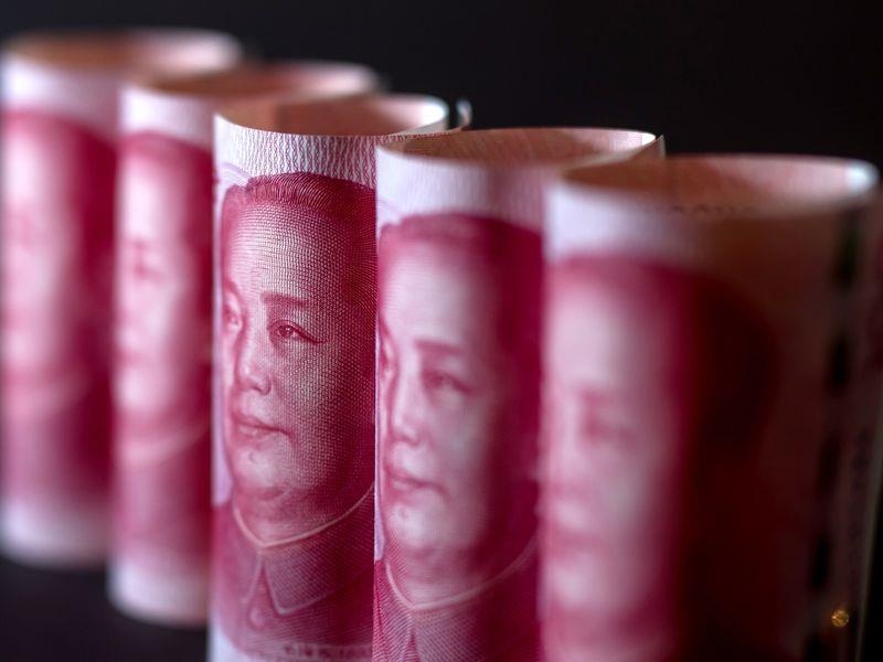 Gia nhan dan te rot xuong muc thap nhat trong 11 nam qua hinh anh