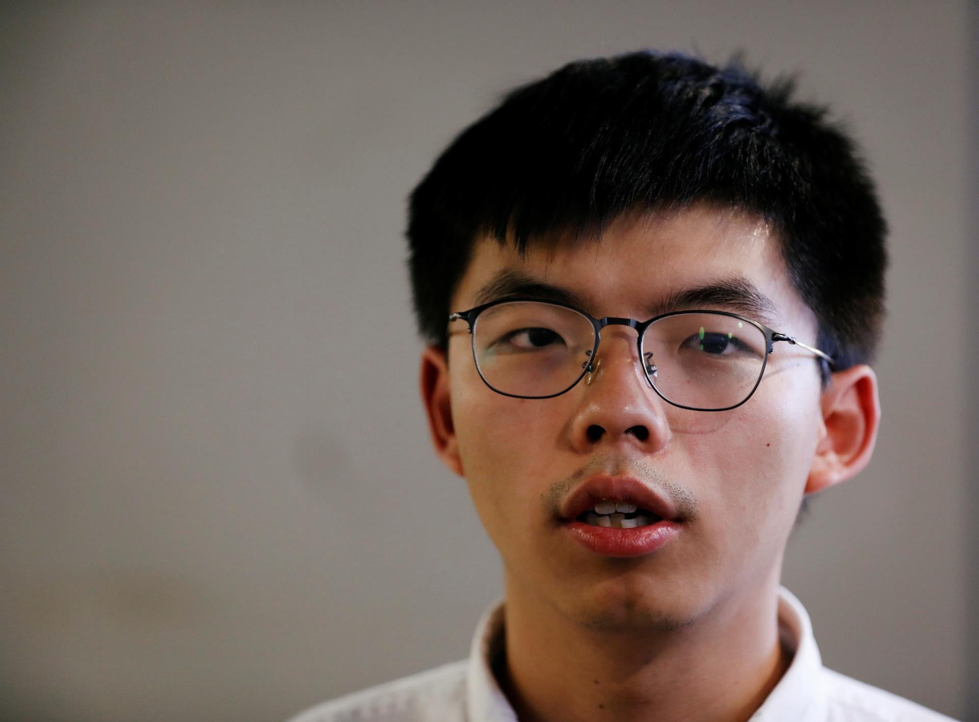 Joshua Wong bi bat lai sau khi tro ve tu Dai Loan hinh anh