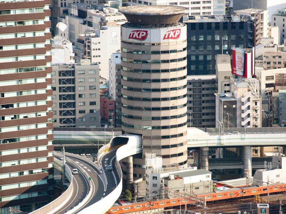 Duong cao toc xuyen qua toa nha 16 tang o Nhat Ban hinh anh