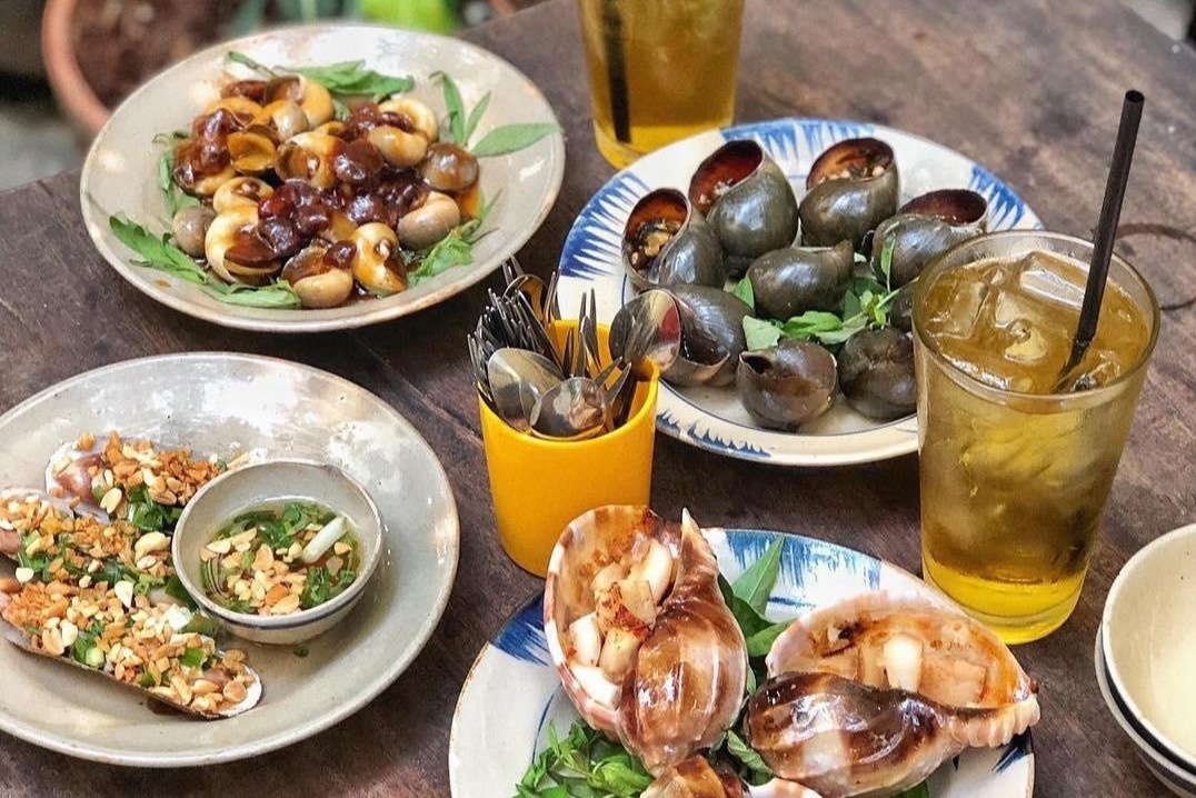 Nham nhi oc va 6 mon an duong pho hap dan tai Sai thanh hinh anh